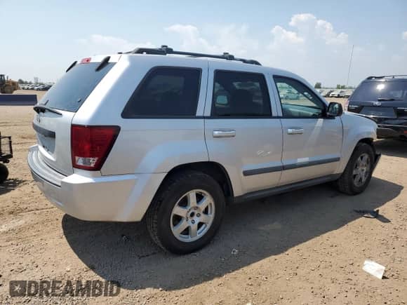 2009 Jeep Grand Cherokee Laredo with VIN 1J8GS48K79C512557, listed as a Copart auction lot 67475735 with 204,364 mi miles and Salvage title. Bid and sale history available at DreamBid. Image 3.