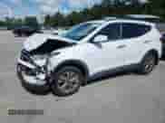 2016 Hyundai Santa Fe with VIN 5XYZU3LB2GG335212, listed as a Copart auction lot 65273225 with 107,801 mi miles and Salvage title. Bid and sale history available at DreamBid. Image 1.