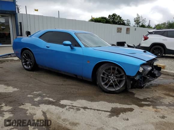 2023 Dodge Challenger R/T Scat Pack with VIN 2C3CDZFJ6PH558886, listed as a Copart auction lot 63033205 with 10,694 mi miles and Salvage title. Bid and sale history available at DreamBid. Image 4.