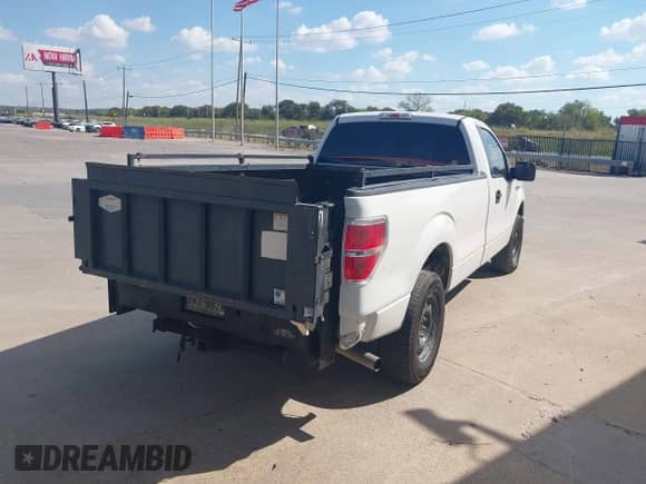 2013 Ford F-150 XL with VIN 1FTNF1CF3DKE07122, listed as a IAAI auction lot 43481689 with 259,721 mi miles and . Bid and sale history available at DreamBid. Image 4.