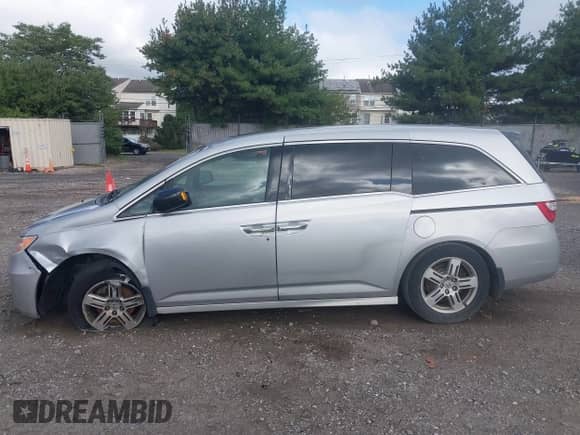 2011 Honda Odyssey Touring с VIN 5FNRL5H97BB020359, выставлен на аукционе IAAI как лот 43237938 с пробегом 232 684 миль миль и . История ставок и продаж доступна на DreamBid. Изображение 14.
