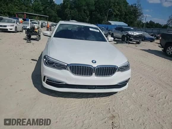 2018 BMW 5 Series 540i z VIN WBAJE5C55JWA97561, wystawiony jako Copart lot #71202295 z przebiegiem 57 619 mil mil oraz Szkoda całkowita • Salvage title. Historia ofert i sprzedaży dostępna na DreamBid. Obrazek 13.