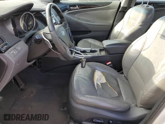 2013 Hyundai Sonata SE с VIN 5NPEC4AB4DH703744, выставлен на аукционе Copart как лот 57804415 с пробегом 129 492 миль миль и Списание • Salvage title. История ставок и продаж доступна на DreamBid. Изображение 7.