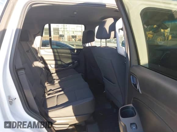 2018 Chevrolet Tahoe Commercial z VIN 1GNSKFECXJR201692, wystawiony jako IAAI lot #41606352 z przebiegiem 36 882 mil mil oraz . Historia ofert i sprzedaży dostępna na DreamBid. Obrazek 8.