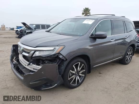 2021 Honda Pilot Touring 7-Passenger z VIN 5FNYF6H66MB045819, wystawiony jako IAAI lot #42095117 z przebiegiem 36 506 mil mil oraz . Historia ofert i sprzedaży dostępna na DreamBid. Obrazek 20.