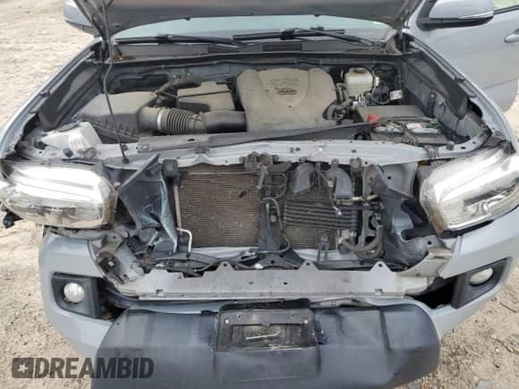 2019 Toyota Tacoma TRD Off Road z VIN 3TMCZ5ANXKM213550, wystawiony jako Copart lot #81675915 z przebiegiem 78 339 mil mil oraz Szkoda całkowita • Salvage title. Historia ofert i sprzedaży dostępna na DreamBid. Obrazek 11.
