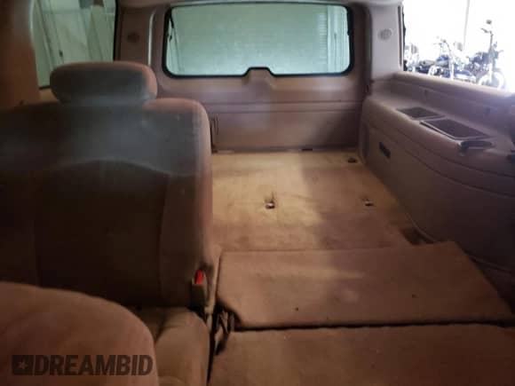 2002 Chevrolet Suburban LS с VIN 1GNFK16Z12J326815, выставлен на аукционе Copart как лот 63348745 с пробегом 296 618 миль миль и Списание • Salvage title. История ставок и продаж доступна на DreamBid. Изображение 10.