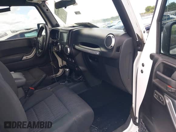 2012 Jeep Wrangler Arctic with VIN 1C4AJWBG2CL229653, listed as a IAAI auction lot 42469581 with 85,293 mi miles and . Bid and sale history available at DreamBid. Image 5.