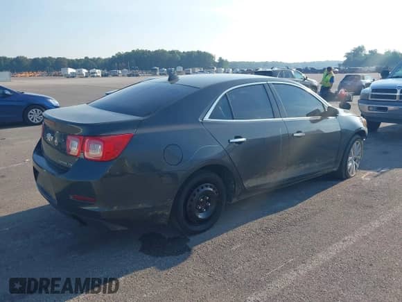 2014 Chevrolet Malibu LTZ with VIN 1G11H5SL3EF196689, listed as a IAAI auction lot 42940591 with 135,300 mi miles and . Bid and sale history available at DreamBid. Image 4.
