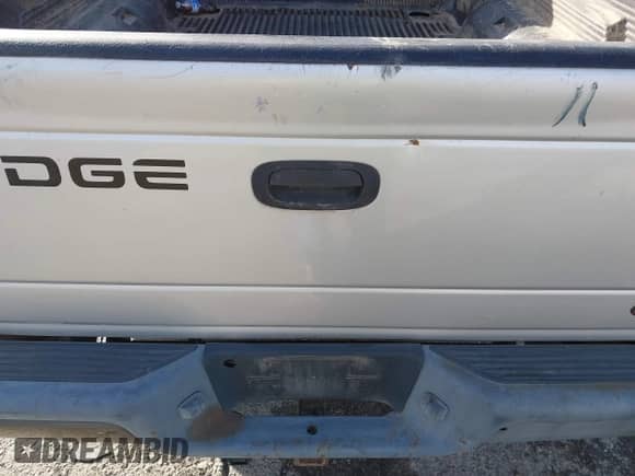 2002 Dodge Dakota z VIN 1B7GL12X42S708569, wystawiony jako IAAI lot #43535850 z przebiegiem 225 885 mil mil oraz . Historia ofert i sprzedaży dostępna na DreamBid. Obrazek 13.