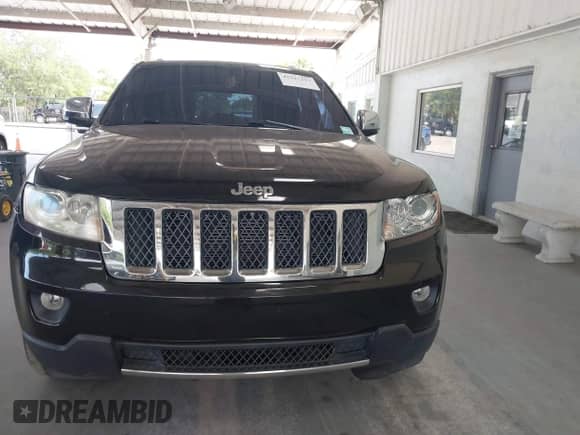 2012 Jeep Grand Cherokee Overland with VIN 1C4RJECG2CC290951, listed as a IAAI auction lot 42327217 with 122,108 mi miles and . Bid and sale history available at DreamBid. Image 13.