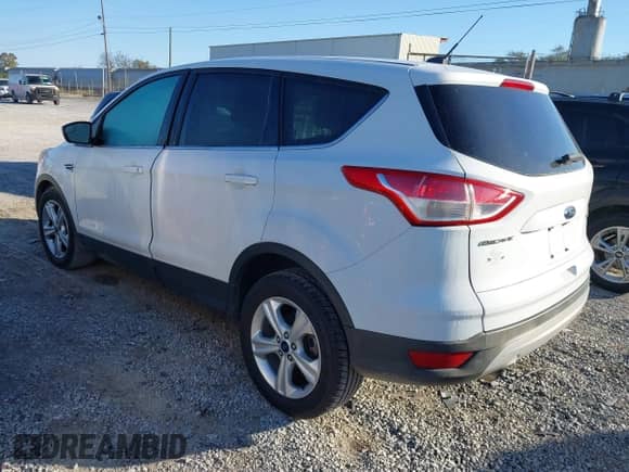 2014 Ford Escape SE with VIN 1FMCU0GX5EUC77081, listed as a IAAI auction lot 43527210 with 73,924 mi miles and . Bid and sale history available at DreamBid. Image 3.