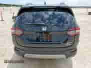 2025 Honda Pilot Touring с VIN 5FNYG2H70SB016778, выставлен на аукционе Copart как лот 60674115 с пробегом 5 294 миль миль и Списание • Salvage title. История ставок и продаж доступна на DreamBid. Изображение 6.