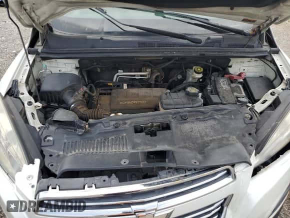 2015 Chevrolet Trax LT z VIN KL7CJRSB7FB111443, wystawiony jako Copart lot #69103095 z przebiegiem Nie podano mil oraz Szkoda całkowita • Salvage title. Historia ofert i sprzedaży dostępna na DreamBid. Obrazek 11.