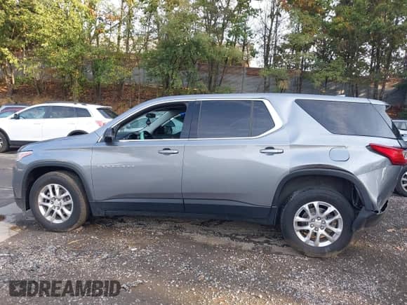 2019 Chevrolet Traverse LS z VIN 1GNERFKW6KJ215239, wystawiony jako IAAI lot #43262435 z przebiegiem 91 631 mil mil oraz . Historia ofert i sprzedaży dostępna na DreamBid. Obrazek 14.