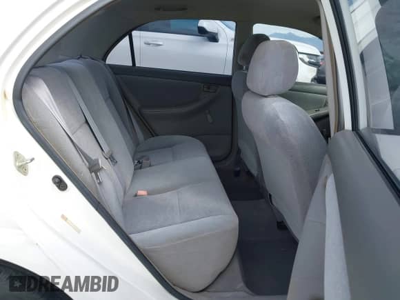 2004 Toyota Corolla CE z VIN JTDBR32E742037694, wystawiony jako IAAI lot #43246589 z przebiegiem 90 231 mil mil oraz . Historia ofert i sprzedaży dostępna na DreamBid. Obrazek 8.