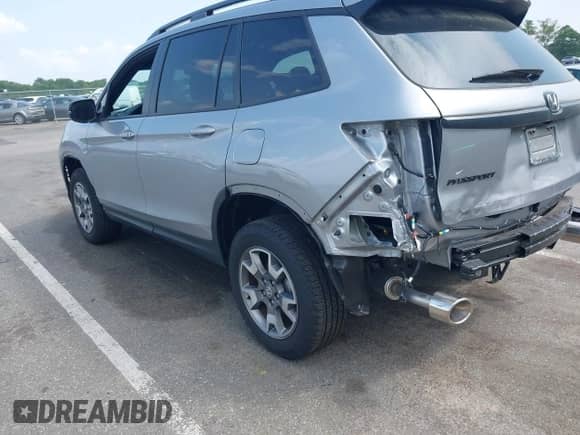 2023 Honda Passport TrailSport с VIN 5FNYF8H68PB043019, выставлен на аукционе IAAI как лот 42456931 с пробегом 7 311 миль миль и . История ставок и продаж доступна на DreamBid. Изображение 3.