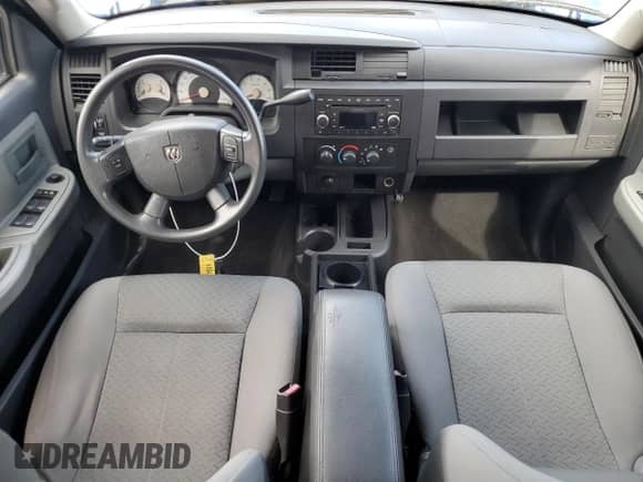 2008 Dodge Dakota с VIN 1D3HW38K18S526797, выставлен на аукционе Copart как лот 71172075 с пробегом 126 696 миль миль и Списание • Salvage title. История ставок и продаж доступна на DreamBid. Изображение 8.