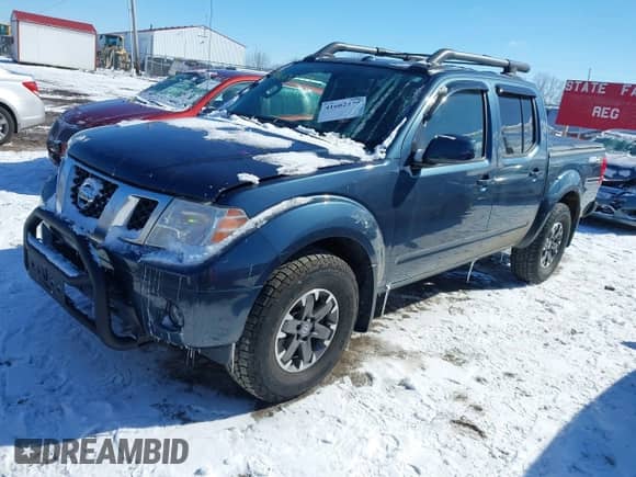 2014 Nissan Frontier SV z VIN 1N6AD0EV4EN734483, wystawiony jako IAAI lot #41602279 z przebiegiem 93 336 mil mil oraz . Historia ofert i sprzedaży dostępna na DreamBid. Obrazek 17.