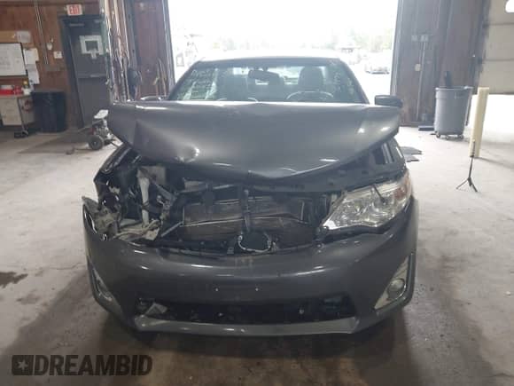 2014 Toyota Camry LE z VIN 4T1BD1FK0EU098485, wystawiony jako IAAI lot #43305714 z przebiegiem 69 977 mil mil oraz . Historia ofert i sprzedaży dostępna na DreamBid. Obrazek 12.