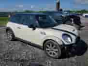 2011 MINI Hardtop S with VIN WMWSV3C50BTY15977, listed as a Copart auction lot 52802295 with 89,085 mi miles and Salvage title. Bid and sale history available at DreamBid. Image 4.