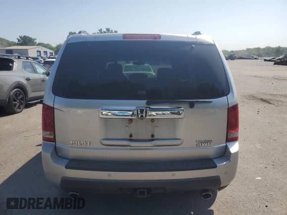 2009 Honda Pilot Touring with VIN 5FNYF48829B024561, listed as a Copart auction lot 66168365 with 150,536 mi miles and Salvage title. Bid and sale history available at DreamBid. Image 6.
