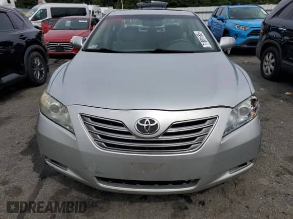 2007 Toyota Camry с VIN JTNBB46K973006807, выставлен на аукционе Copart как лот 71801665 с пробегом 152 050 миль миль и Списание • Salvage title. История ставок и продаж доступна на DreamBid. Изображение 5.