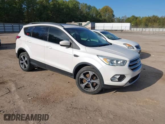 2017 Ford Escape SE with VIN 1FMCU9G94HUB77175, listed as a IAAI auction lot 43359533 with 153,347 mi miles and . Bid and sale history available at DreamBid. Image 1.
