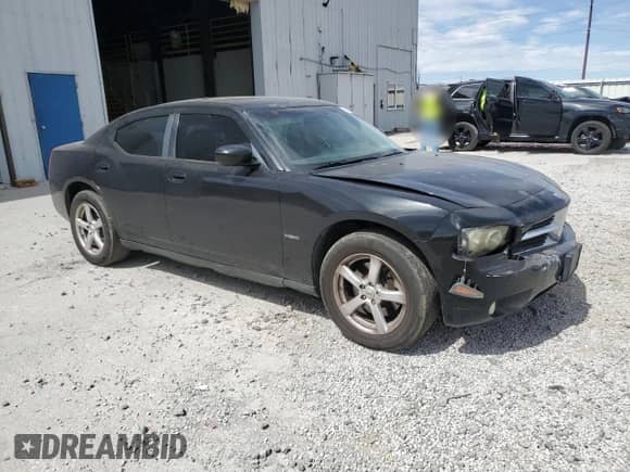 2007 Dodge Charger R/T with VIN 2B3KK53H27H792015, listed as a Copart auction lot 69704755 with 214,086 mi miles and Salvage title. Bid and sale history available at DreamBid. Image 4.