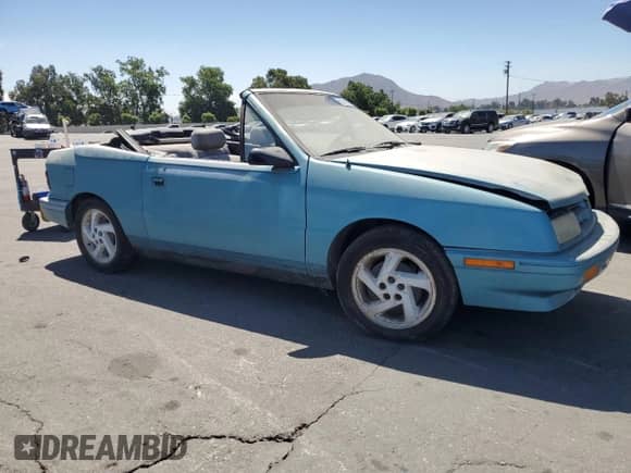 1993 Dodge Shadow with VIN 3B3XP45K6PT583605, listed as a Copart auction lot 61041005 with 166,515 mi miles and Clean title. Bid and sale history available at DreamBid. Image 4.