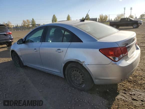 2011 Chevrolet Cruze 1LT z VIN 1G1PF5S94B7178566, wystawiony jako Copart lot #86180255 z przebiegiem 183 110 mil mil oraz Czysty tytuł • Clean title. Historia ofert i sprzedaży dostępna na DreamBid. Obrazek 2.