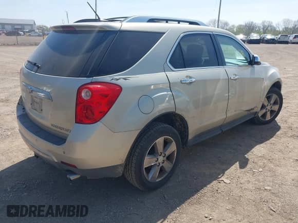 2013 Chevrolet Equinox LTZ z VIN 2GNFLFE3XD6207717, wystawiony jako IAAI lot #42083178 z przebiegiem 219 888 mil mil oraz . Historia ofert i sprzedaży dostępna na DreamBid. Obrazek 4.