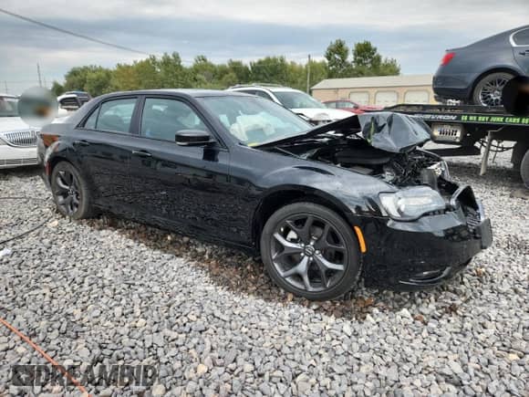 2023 Chrysler 300 S with VIN 2C3CCABG8PH596103, listed as a Copart auction lot 71770925 with 9,915 mi miles and Salvage title. Bid and sale history available at DreamBid. Image 4.