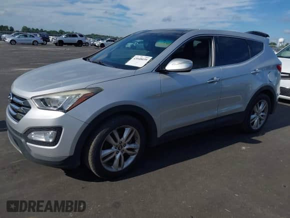 2013 Hyundai Santa Fe Sport with VIN 5XYZW3LA6DG001939, listed as a IAAI auction lot 43048039 with 180,925 mi miles and . Bid and sale history available at DreamBid. Image 2.