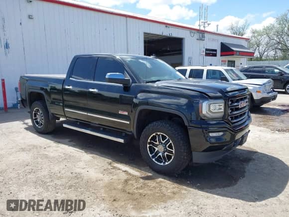 2016 GMC Sierra 1500 SLE with VIN 1GTV2MEC5GZ106217, listed as a IAAI auction lot 42243559 with 136,855 mi miles and . Bid and sale history available at DreamBid. Image 1.