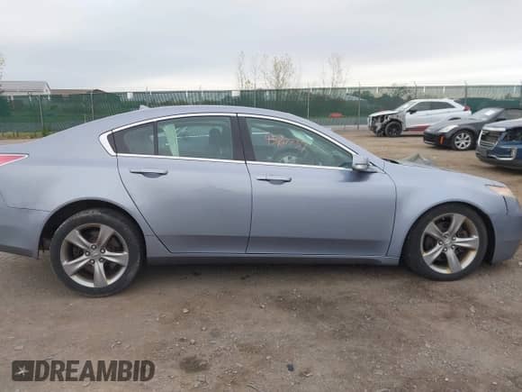 2012 Acura TL Auto z VIN 19UUA9F23CA002935, wystawiony jako IAAI lot #43467737 z przebiegiem 211 678 mil mil oraz . Historia ofert i sprzedaży dostępna na DreamBid. Obrazek 14.