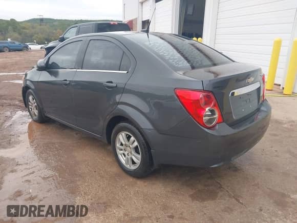 2013 Chevrolet Sonic LT with VIN 1G1JC5SH7D4221114, listed as a IAAI auction lot 43444324 with 173,484 mi miles and . Bid and sale history available at DreamBid. Image 3.