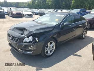 2015 Volvo S60 T5 Drive-E Premier с VIN YV140MFK6F2336518, выставлен на аукционе Copart как лот 68339405 с пробегом 142 401 миль миль и Списание • Salvage title. История ставок и продаж доступна на DreamBid. Изображение 1.