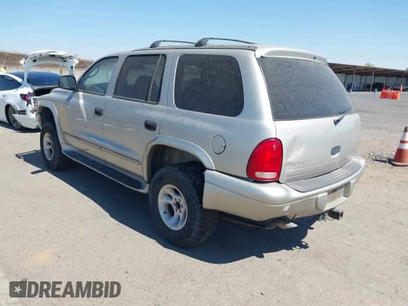2001 Dodge Durango with VIN 1B4HS28N21F565015, listed as a IAAI auction lot 42744735 with 163,512 mi miles and . Bid and sale history available at DreamBid. Image 3.