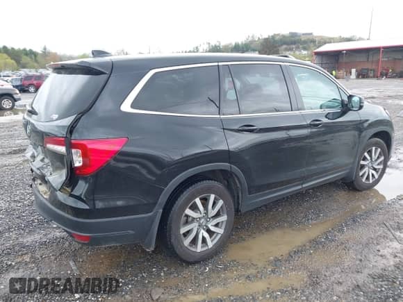 2022 Honda Pilot EX-L with VIN 5FNYF5H55NB038699, listed as a IAAI auction lot 41967073 with 58,097 mi miles and . Bid and sale history available at DreamBid. Image 4.