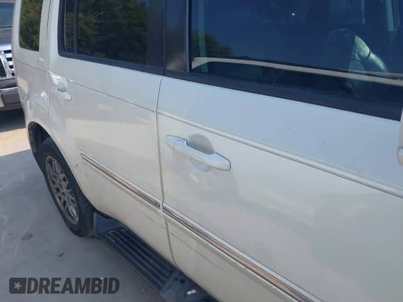 2015 Honda Pilot Touring с VIN 5FNYF3H92FB007774, выставлен на аукционе IAAI как лот 43083627 с пробегом 148 676 миль миль и . История ставок и продаж доступна на DreamBid. Изображение 13.