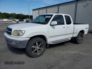 2002 Toyota Tundra Limited с VIN 5TBBT48172S298091, выставлен на аукционе Copart как лот 81839095 с пробегом 191 659 миль миль и Списание • Salvage title. История ставок и продаж доступна на DreamBid. Изображение 1.