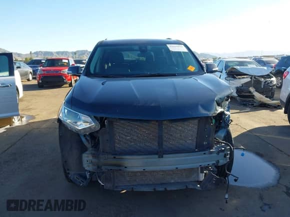 2020 Chevrolet Traverse LT Cloth z VIN 1GNERGKW4LJ328615, wystawiony jako IAAI lot #43565822 z przebiegiem 45 619 mil mil oraz . Historia ofert i sprzedaży dostępna na DreamBid. Obrazek 13.