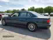 1998 BMW 7 Series 740i with VIN WBAGF8325WDL51588, listed as a Copart auction lot 66292195 with 121,919 mi miles and Salvage title. Bid and sale history available at DreamBid. Image 2.