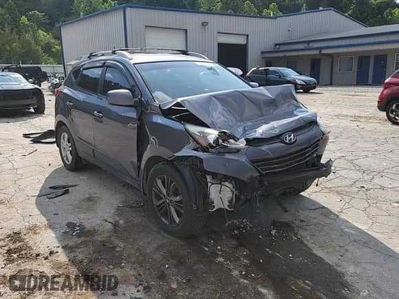 2015 Hyundai Tucson SE z VIN KM8JUCAG9FU991153, wystawiony jako Copart lot #63429555 z przebiegiem 160 649 mil mil oraz Szkoda całkowita • Salvage title. Historia ofert i sprzedaży dostępna na DreamBid. Obrazek 14.