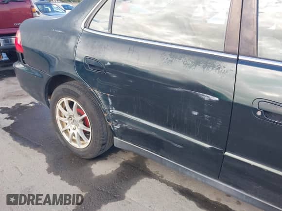 2000 Honda Accord SE with VIN JHMCG5670YC013463, listed as a IAAI auction lot 43431174 with 297,350 mi miles and . Bid and sale history available at DreamBid. Image 15.