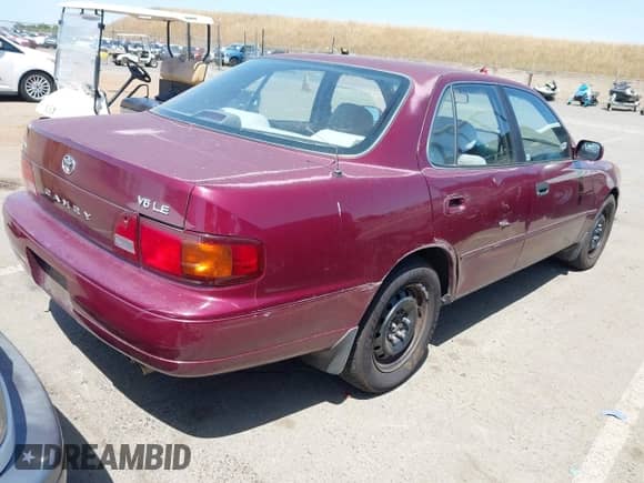 1996 Toyota Camry LE z VIN 4T1BF12K1TU129000, wystawiony jako IAAI lot #42294535 z przebiegiem 157 851 mil mil oraz . Historia ofert i sprzedaży dostępna na DreamBid. Obrazek 4.