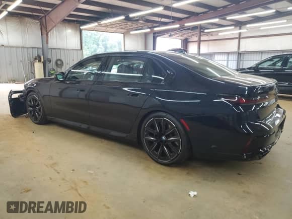 2023 BMW 7 Series 760i xDrive с VIN WBA33EJ01PCM34367, выставлен на аукционе Copart как лот 66617815 с пробегом 21 759 миль миль и Списание • Salvage title. История ставок и продаж доступна на DreamBid. Изображение 2.