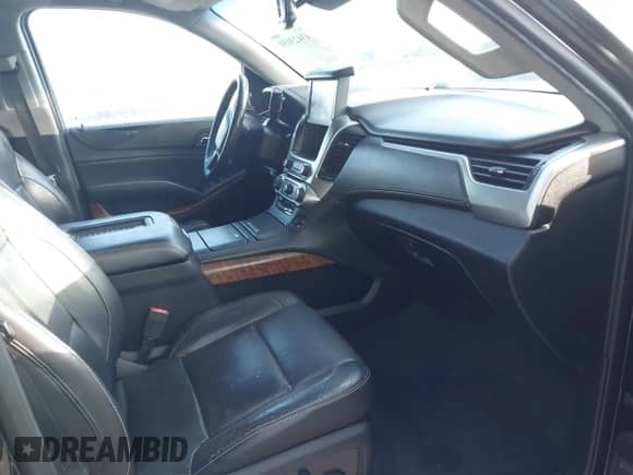 2019 Chevrolet Suburban Premier with VIN 1GNSKJKJ3KR330784, listed as a IAAI auction lot 43423030 with 204,797 mi miles and . Bid and sale history available at DreamBid. Image 5.