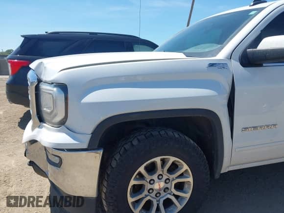 2018 GMC Sierra 1500 SLE with VIN 1GTV2MEC6JZ109134, listed as a IAAI auction lot 42798157 with 156,593 mi miles and . Bid and sale history available at DreamBid. Image 6.